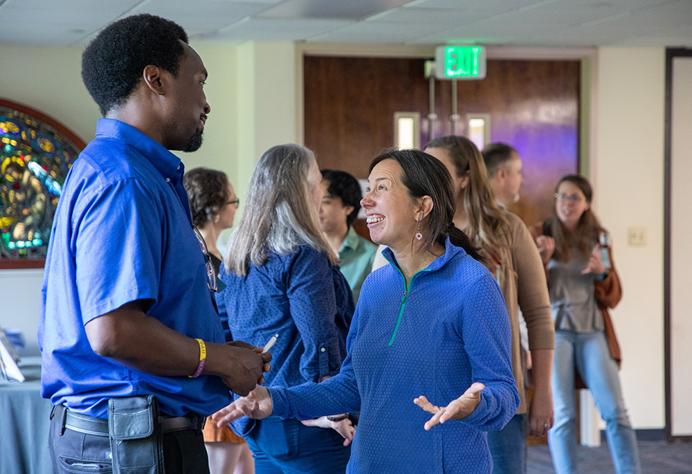 Allison Beyer and H. Jay Dunmore discuss plans to combine their individual works into a moving musical performance. (Courtesy of Jesuit Conference of Canada and the United States)