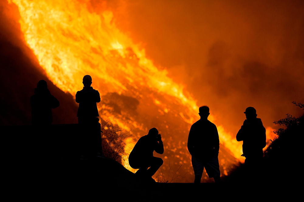 People in Yorba Linda, California, are seen near the Blue Ridge Fire Oct. 26, 2020. (CNS/Reuters/Ringo Chiu)