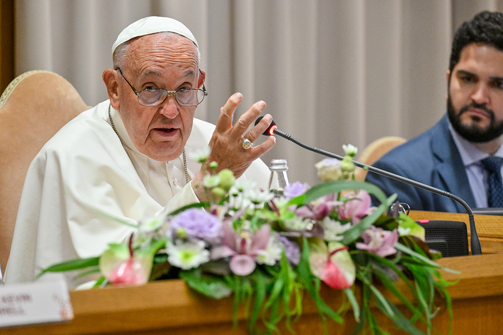 Pope Francis speaks to participants in a conference of moderators of associations of the faithful, ecclesial movements and new movements in the New Synod Hall at the Vatican June 13. (CNS/Vatican Media)