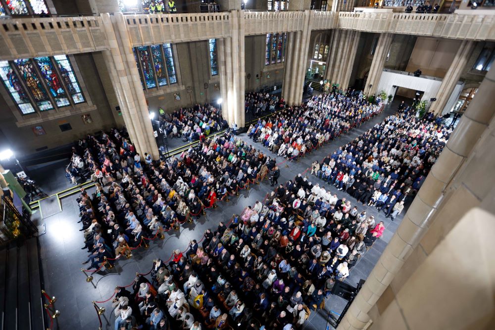 Some 2,600 people gather in the Basilica of the Sacred Heart for a meeting with Pope Francis in Brussels Sept. 28. 