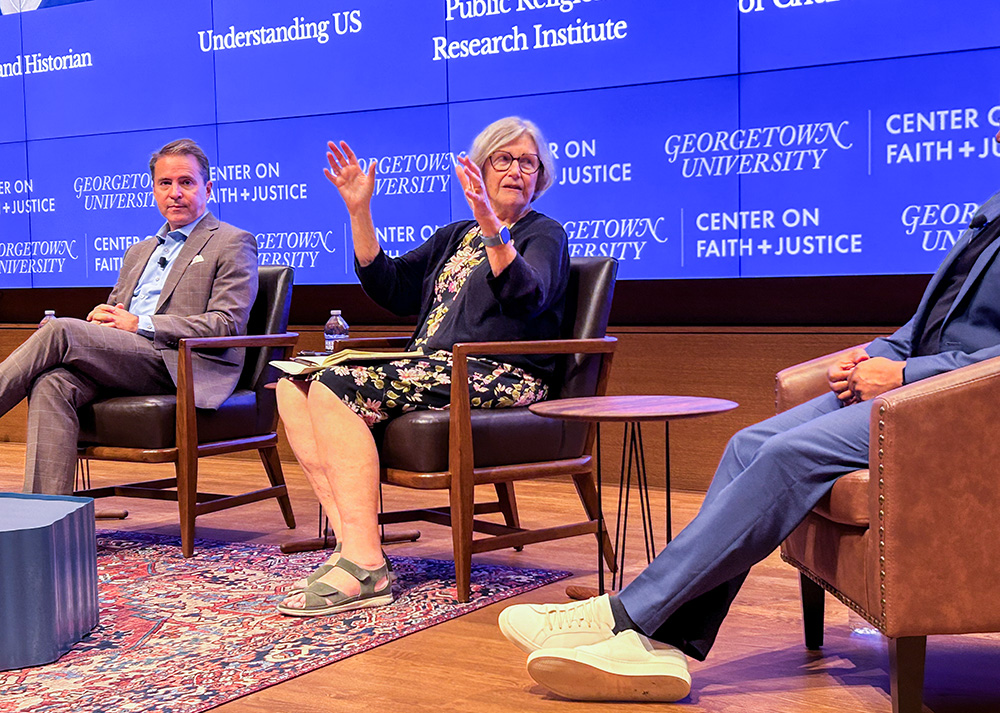 Robert Jones (left) of the Public Religion Research Institute and Social Service Sr. Simone Campbell of Understanding US speak at the September conference "Test of Faith: A Summit to Defend Democracy," hosted by the Center on Faith and Justice at Georgetown University. (Photo by David DeCosse)