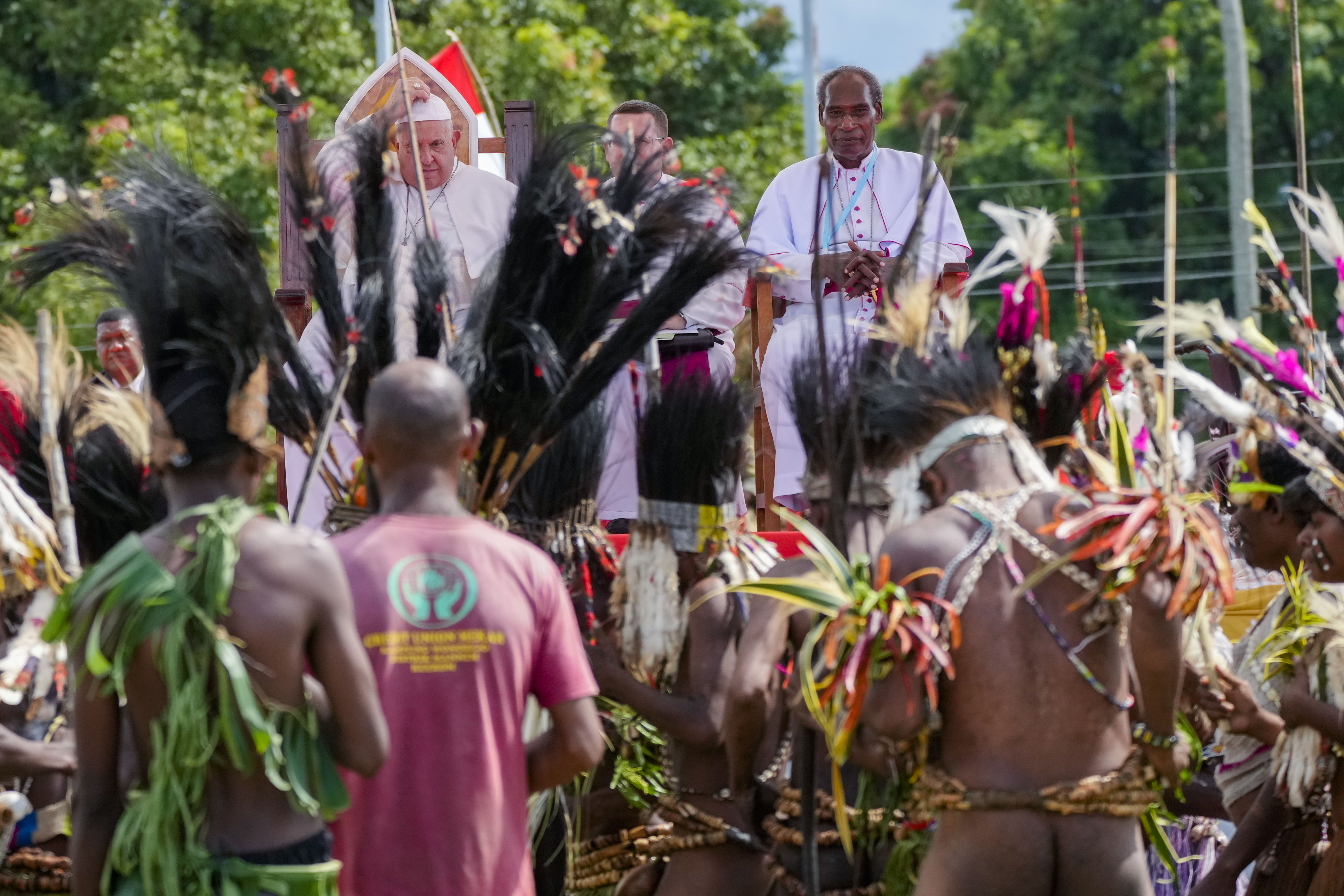 Pope Francis, with the Bishop of Vanimo Francis Meli, right, attends a meeting with faithful in Vanimo, Papua New Guinea Sept. 8, 2024. Pope Francis celebrated the Catholic Church of the peripheries on Sunday as he traveled to the remote jungles of Papua New Guinea, bringing with him a ton of medicine and toys and a message of love overcoming violence for the people who live there. (AP/Gregorio Borgia)