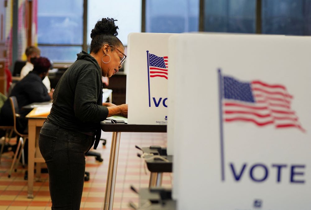 A woman casts her ballot at a polling station in Detroit as Democrats and Republicans held their Michigan presidential primary Feb. 27. (OSV News/Reuters/Dieu-Nalio Chery)