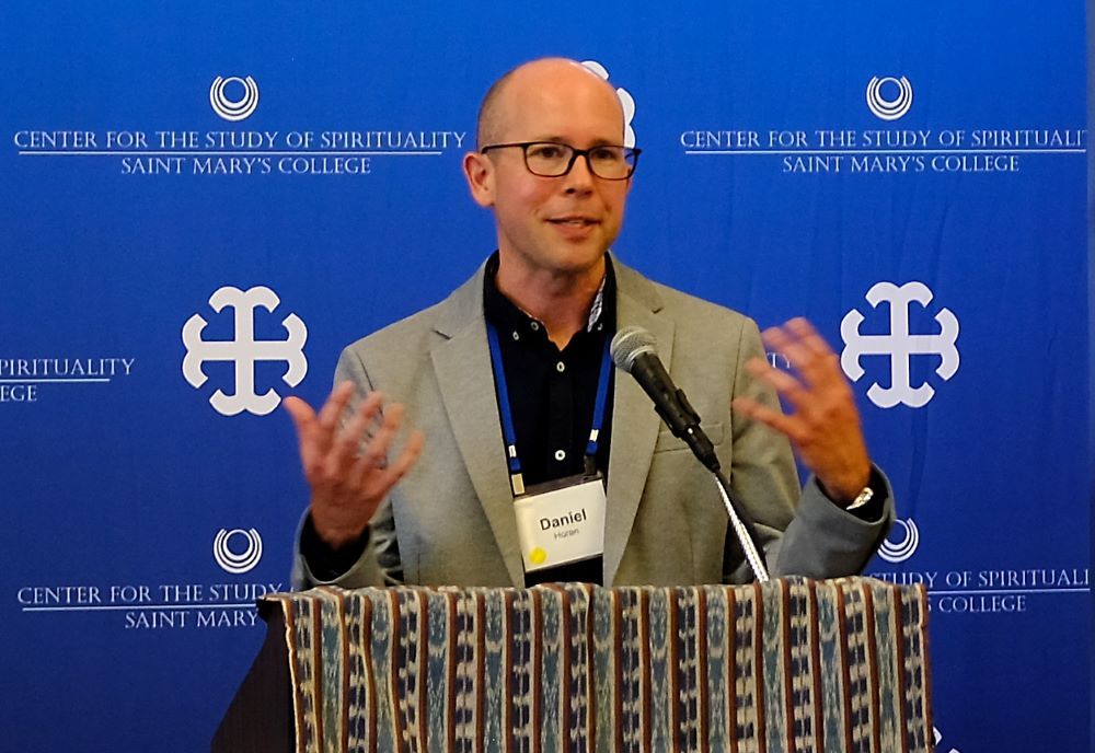 ranciscan Fr. Daniel P. Horan speaks during a July conference.