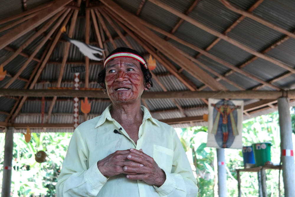 Deacon Shainkiam Yampik Wananch prays in a chapel in Wijint, a village in the Peruvian Amazon, Aug. 20, 2019. (CNS photo/Maria Cervantes, Reuters)