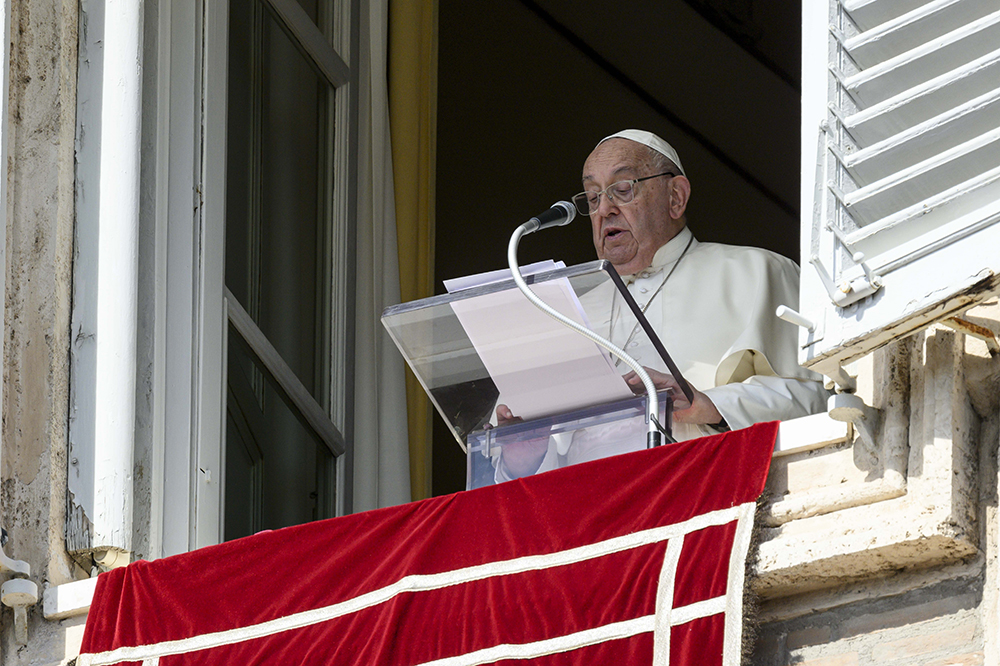 Pope Francis leads the recitation of the Angelus prayer with visitors gathered in St. Peter's Square at the Vatican Oct. 6, 2024. At the end of the Angelus, the pope announced he would create 21 new cardinals Dec. 8. (CNS/Vatican Media)