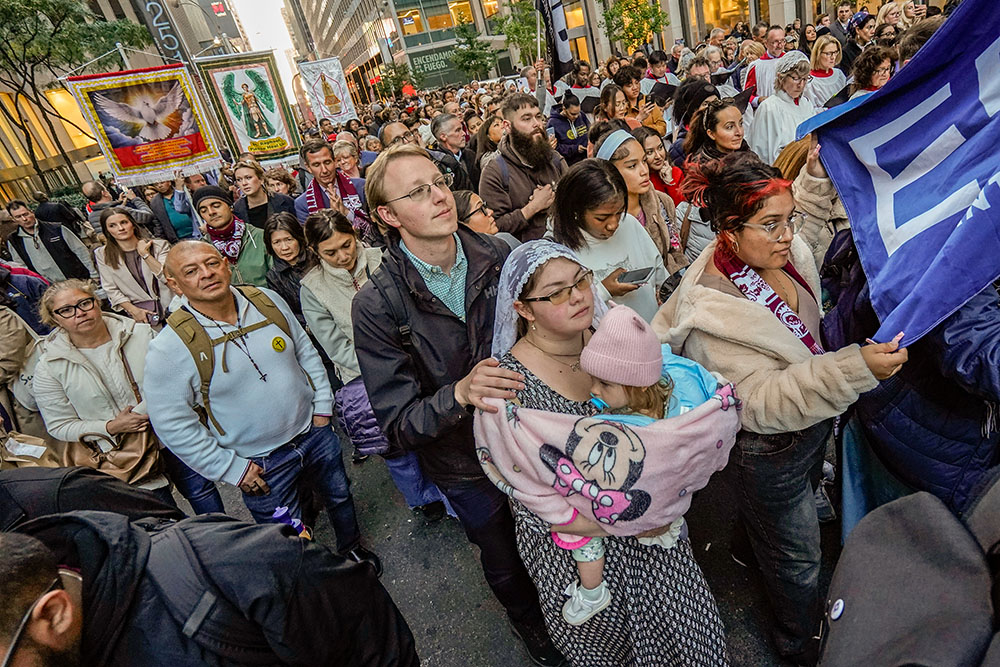 Worshippers participate in a eucharistic procession through Midtown Manhattan in New York City Oct. 15. (OSV News/Gregory A. Shemitz)