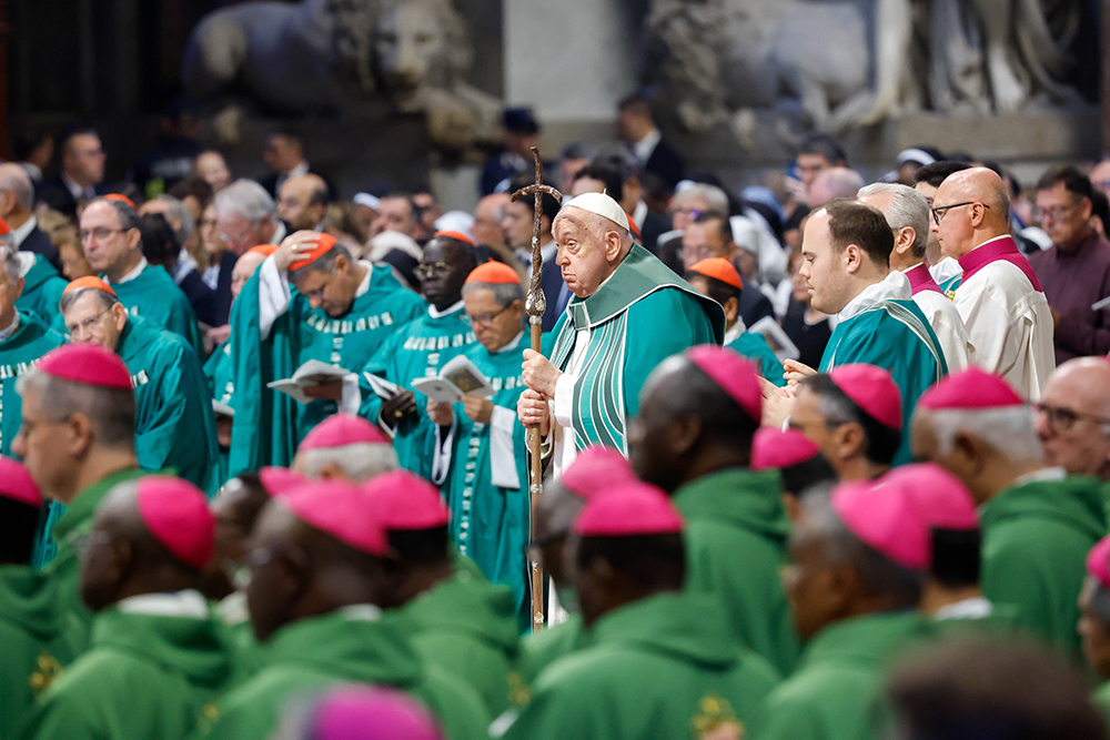 Pope Francis prays during the closing Mass of the Synod of Bishops on synodality in St. Peter's Basilica at the Vatican Oct. 27, 2024. (CNS/Lola Gomez)