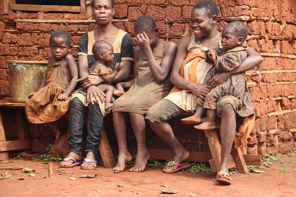 A Baka family is pictured in Elango village in Cameroon's East region. For thousands of years, the Baka lived in the forests of the Congo Basin but have been displaced in recent decades due to extractive industries and conservation efforts. (Angel Ngwe)