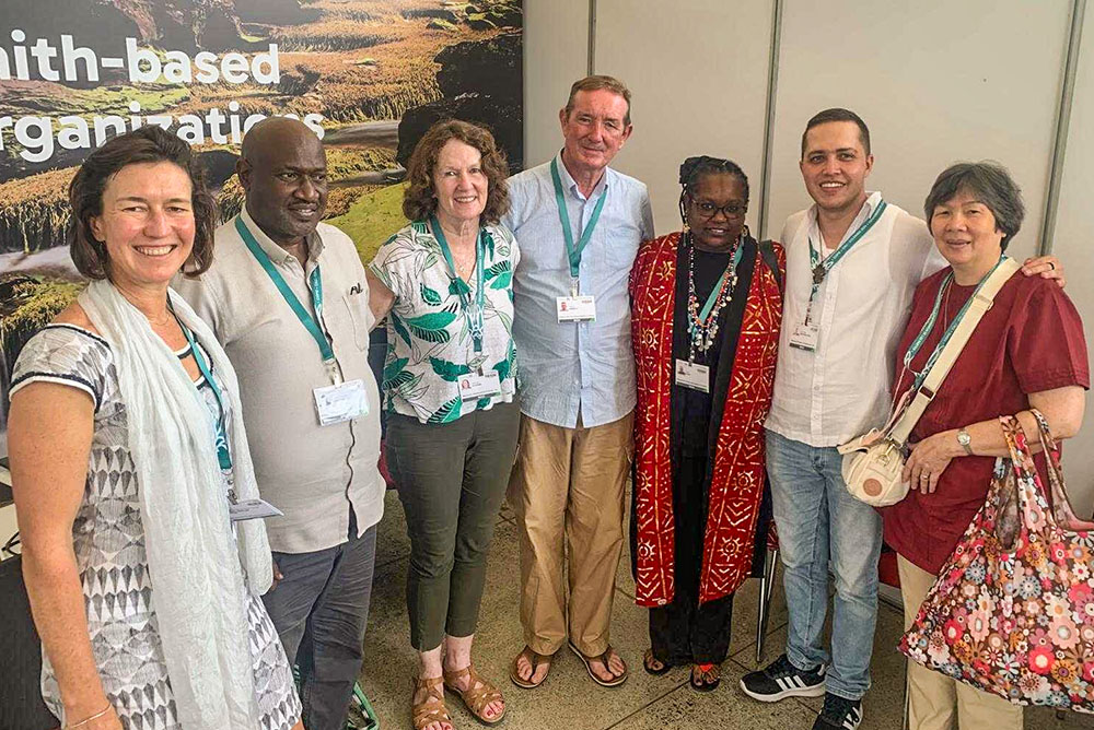 Members of the Maryknoll Office for Global Concerns join with Amazon and Maasai leaders at the faith hub at the COP16 United Nations biodiversity summit in Cali, Colombia. An Oct. 28 event focused on strengthening partnerships with Indigenous and local communities to halt biodiversity loss. (Lisa Sullivan)