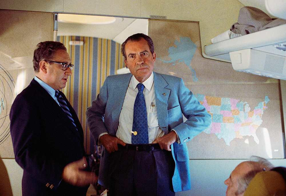 Then-U.S. President Richard Nixon and then-National Security Advisor Henry Kissinger stand on Air Force One during their voyage to China Feb. 20, 1972. Nixon won a second term following the 1972 general election. (OSV News/Richard Nixon Presidential Library handout via Reuters)