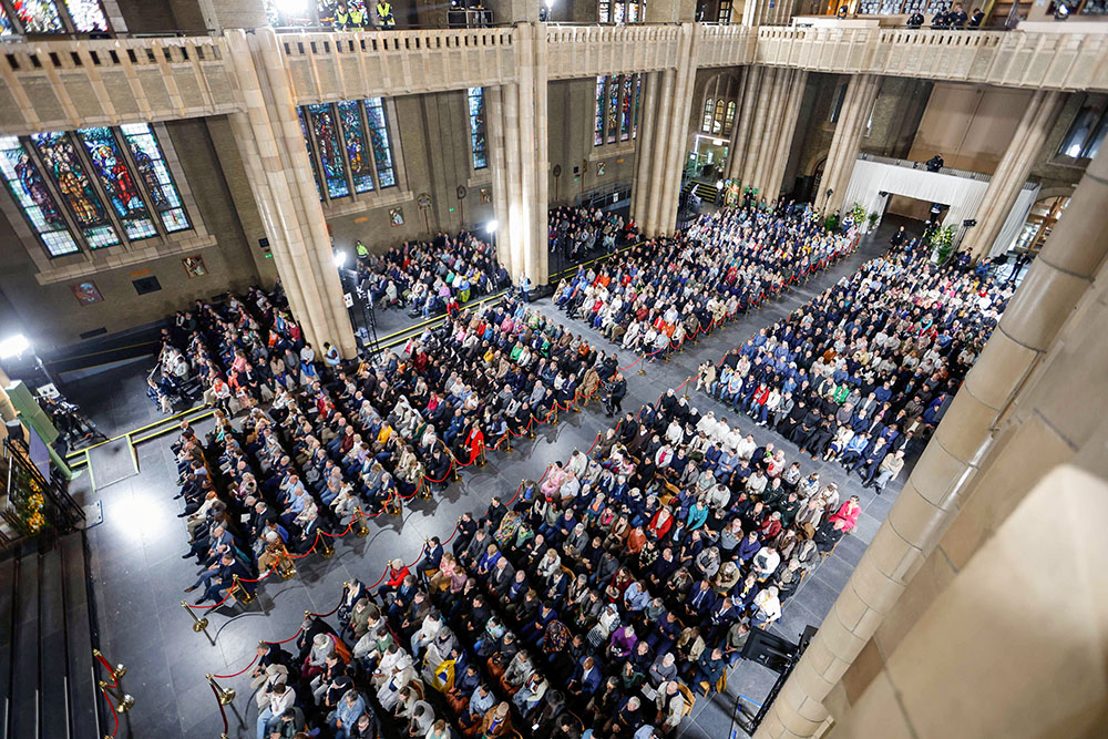 Some 2,600 people gather in the Basilica of the Sacred Heart for a meeting with Pope Francis during a papal visit to Brussels Sept. 28, 2024. The meeting included bishops, priests, deacons, religious, seminarians and pastoral workers ministering in Belgium. (CNS/Lola Gomez)