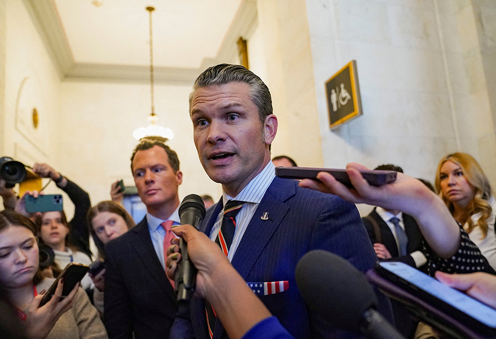 Defense secretary nominee Pete Hegseth speaks with the media as he departs a meeting on Capitol Hill Nov. 21 in Washington. (OSV News/Reuters/Nathan Howard)