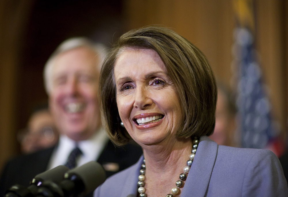 Then-House Speaker Nancy Pelosi, D-Calif., smiles after the passage of the health care reform bill in Washington March 21, 2010. The House of Representatives passed the measure late in the evening with a 219-212 vote after more than a year of partisan debate. (CNS/Joshua Roberts)