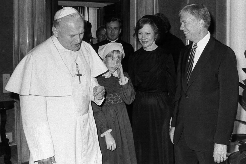 St. John Paul II meets with then-President Jimmy Carter, his wife, Rosalynn, and daughter, Amy, at the Vatican in June of 1980. (OSV News/Arturo Mari)