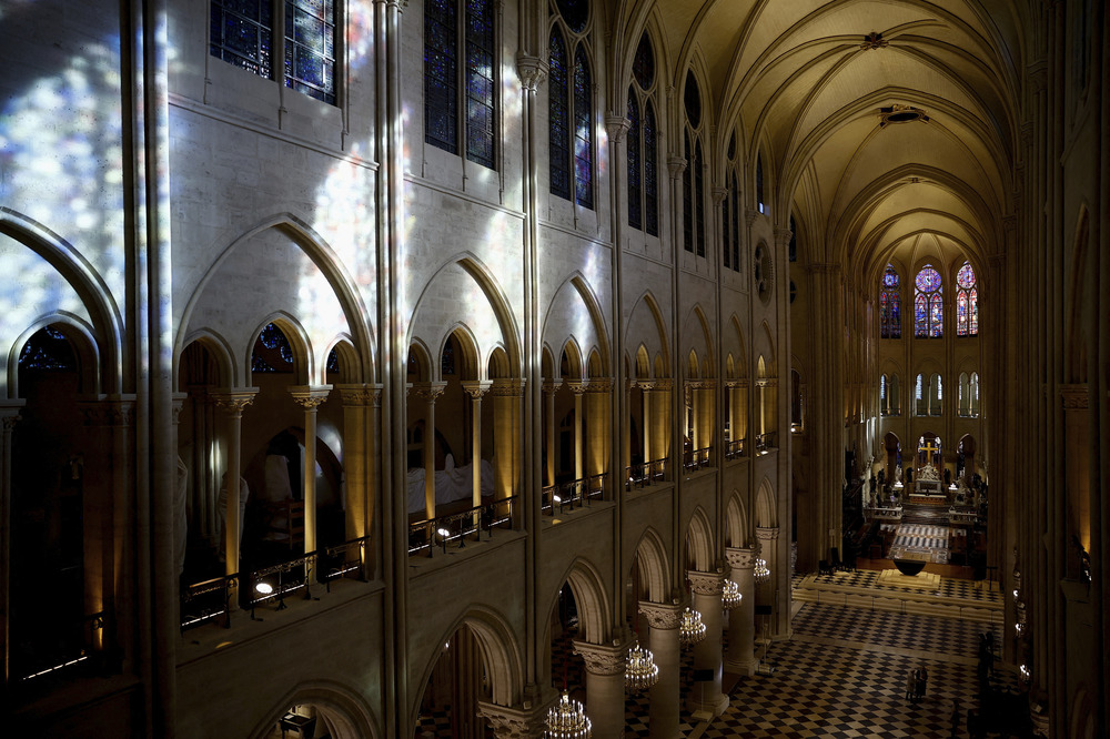 Elevated and angled view of the vast open space of the Cathedral's nave.