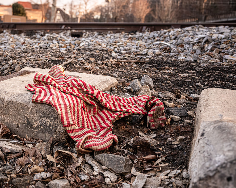 Red-striped sweater, between railroad tracks and the banks of Swannanoa River, near Biltmore Village, Dec. 11, 2024 (Darlene O'Dell)