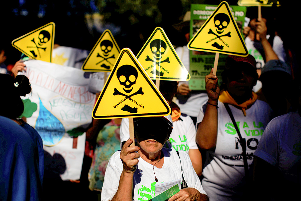 Protesters march against metal mining in a demonstration convened by the Catholic Church in San Salvador, El Salvador, March 9, 2017. That year, the country became the first in the world to ban metal mining. (CNS/Reuters/Jose Cabezas)