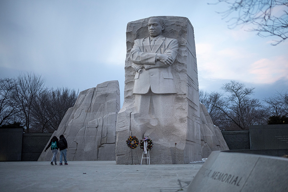 People walk by the Martin Luther King, Jr. Memorial, ahead of the presidential inauguration of U.S. President-elect Donald Trump, in Washington, U.S., Jan. 16, 2025. (Reuters/Marko Djurica)