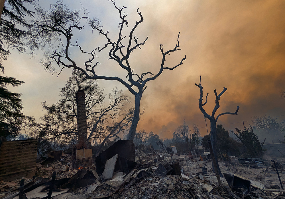 Nick Norman told NCR they didn't see a single firefighter until the end of their efforts on Jan. 8, when the homes that could be saved were already safe. Remains in the neighborhood are pictured in a photo taken that day. (Nick Norman)