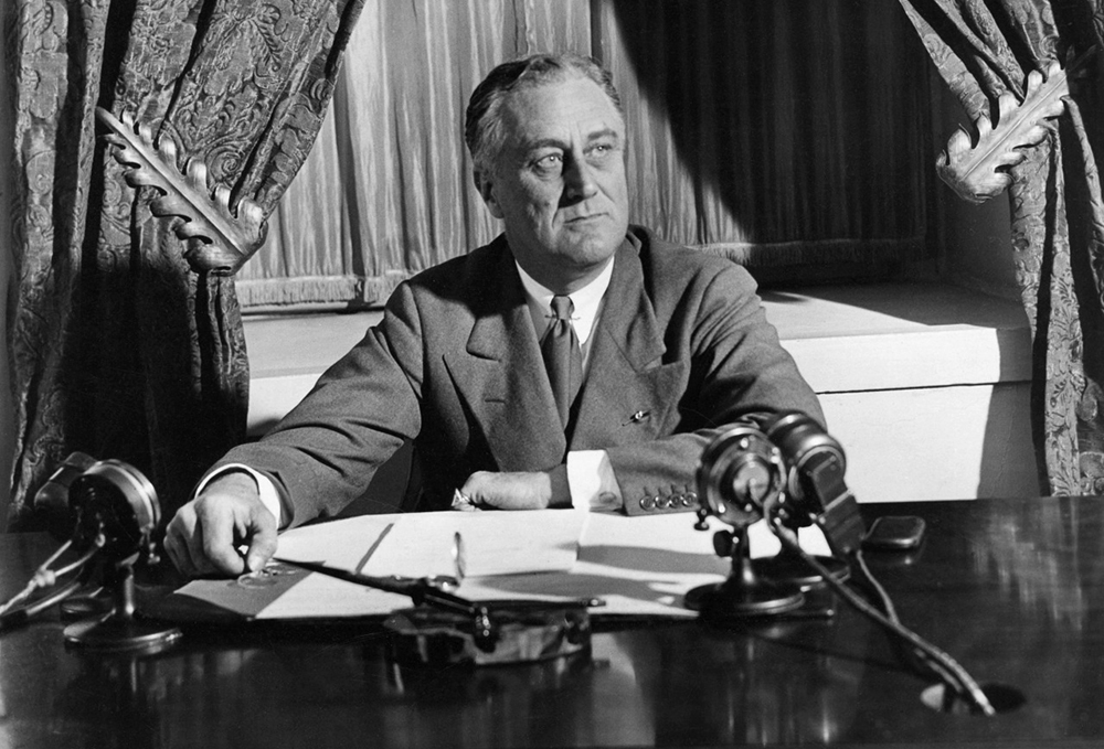 President Franklin D. Roosevelt broadcast his first fireside chat in 1933 regarding the banking crisis from the White House, Washington, D.C. (Wikimedia Commons/National Archives and Records Administration)