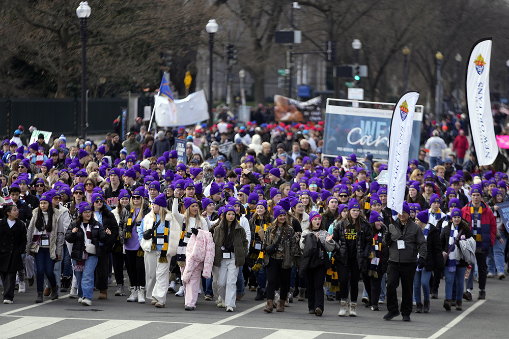 People participating in the annual March for Life, walk from the Washington Monument to the Supreme Court on Jan. 24, 2025, in Washington. (AP Photo/Ben Curtis)