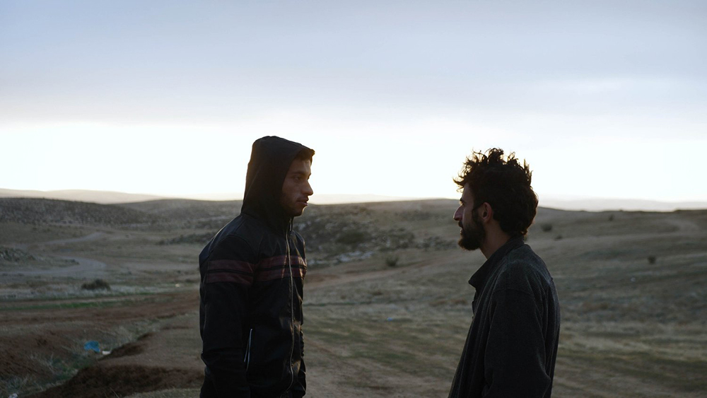 Palestinian activist Basel Adra, left, and Israeli journalist Yuval Abraham in the Oscar-nominated documentary "No Other Land" (Dogwoof)