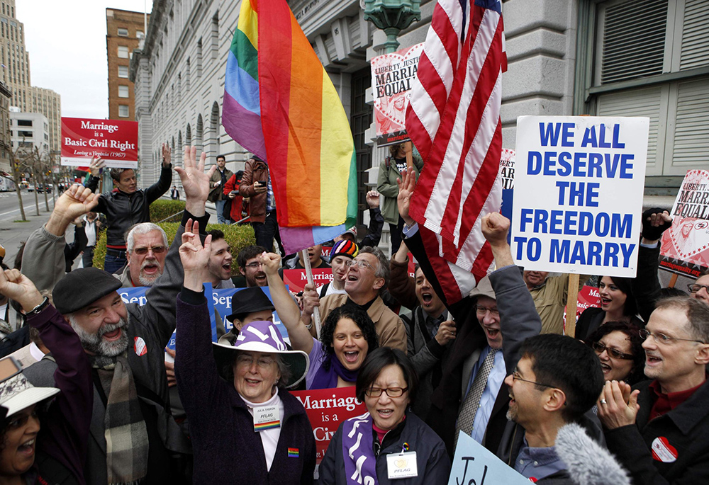 Advocates of same-sex marriage cheer during a rally outside the 9th Circuit Court of Appeals in San Francisco Feb. 7 moments before hearing the court's decision on Proposition 8. By a 2-1 vote, a three-judge panel struck down the California ban on same-sex marriage, saying that it violates the 14th Amendment to the U.S. Constitution (CNS/Reuters/Beck Diefenbach)