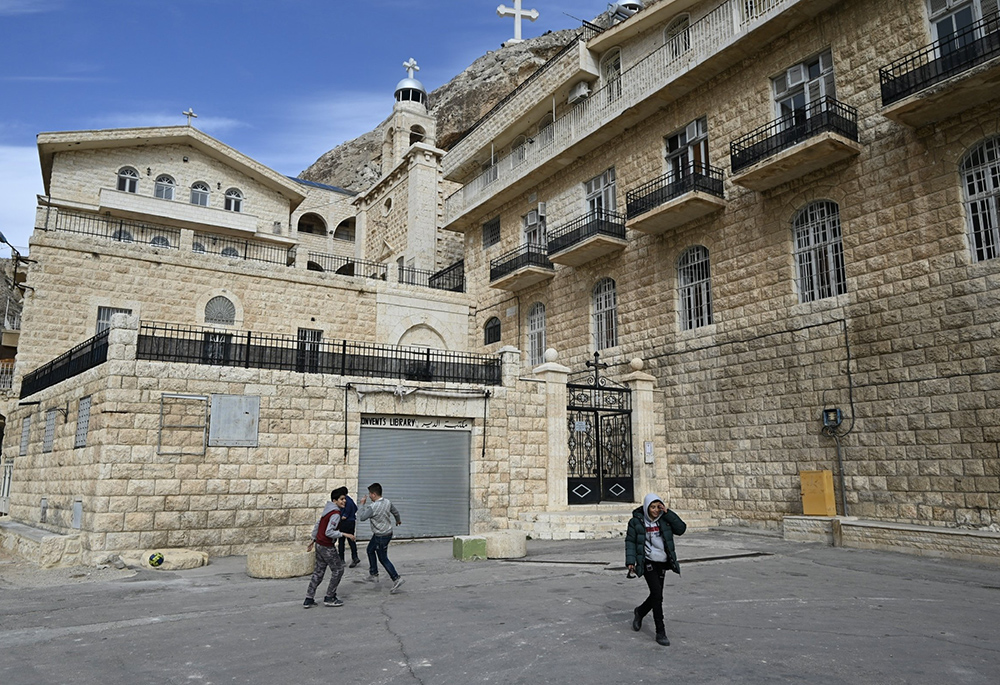 Children play in a square in the Christian town of Maaloula, Syria, on Jan. 4. (OSV News/Leo Morawiecki)