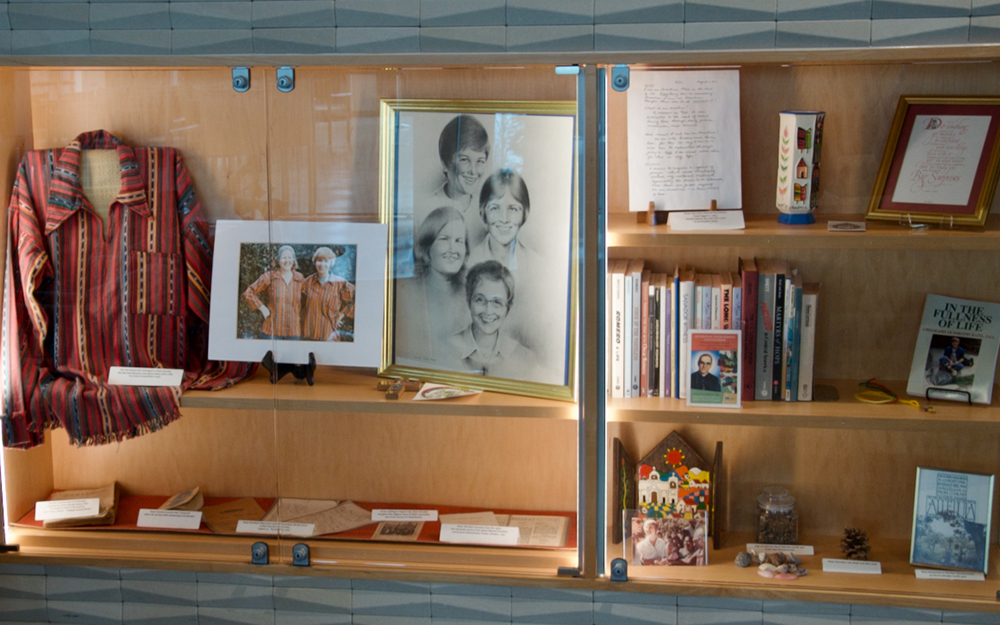 A display case in the gathering area of the Cleveland Ursulines motherhouse is filled with mementos of Sr. Dorothy Kazel, who was killed in 1980 in El Salvador along with lay missioner Jean Donovan and Maryknoll Srs. Maura Clarke and Ita Ford. (GSR photo/Dan Stockman)