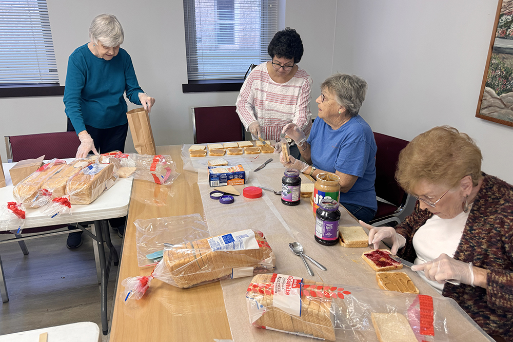 Associates of the Ursuline Sisters of Louisville make sandwiches for the homeless in Louisville, Kentucky. (Photo courtesy of the Ursuline Sisters of Louisville)