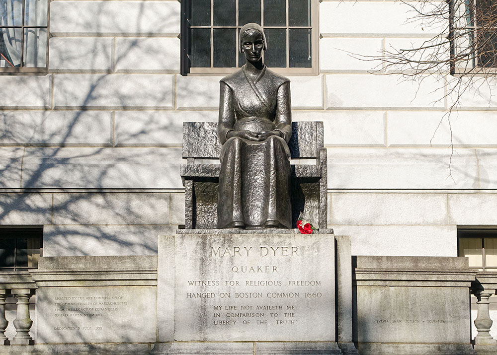 A statue honoring Quaker religious martyr Mary Dyer as a "witness for religious freedom" stands outside the Massachusetts State House in Boston. (Wikimedia Commons/Daderot)