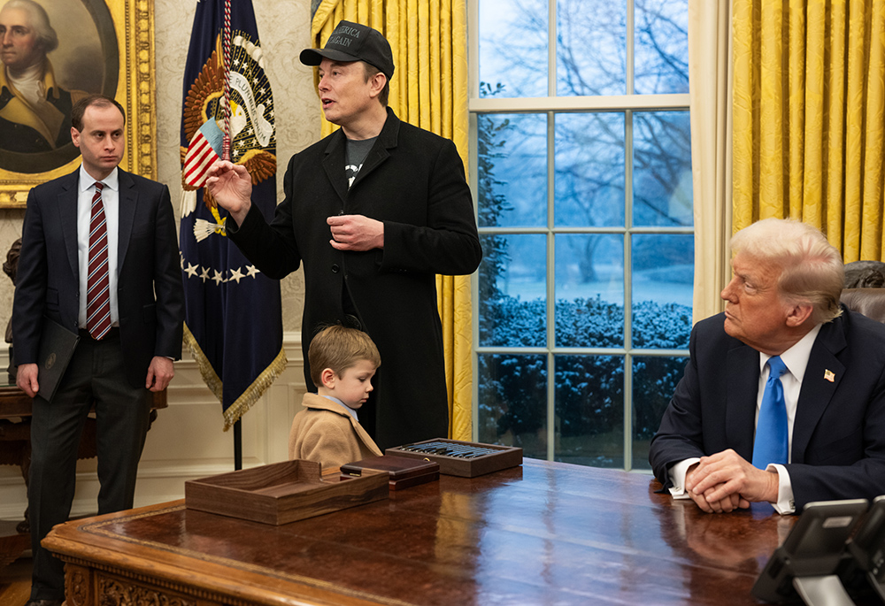 White House staff secretary Will Scharf, Elon Musk and his son X Æ A-Xii are pictured with President Donald Trump at the White House, Feb. 11 in Washington. (Wikimedia Commons/The White House)