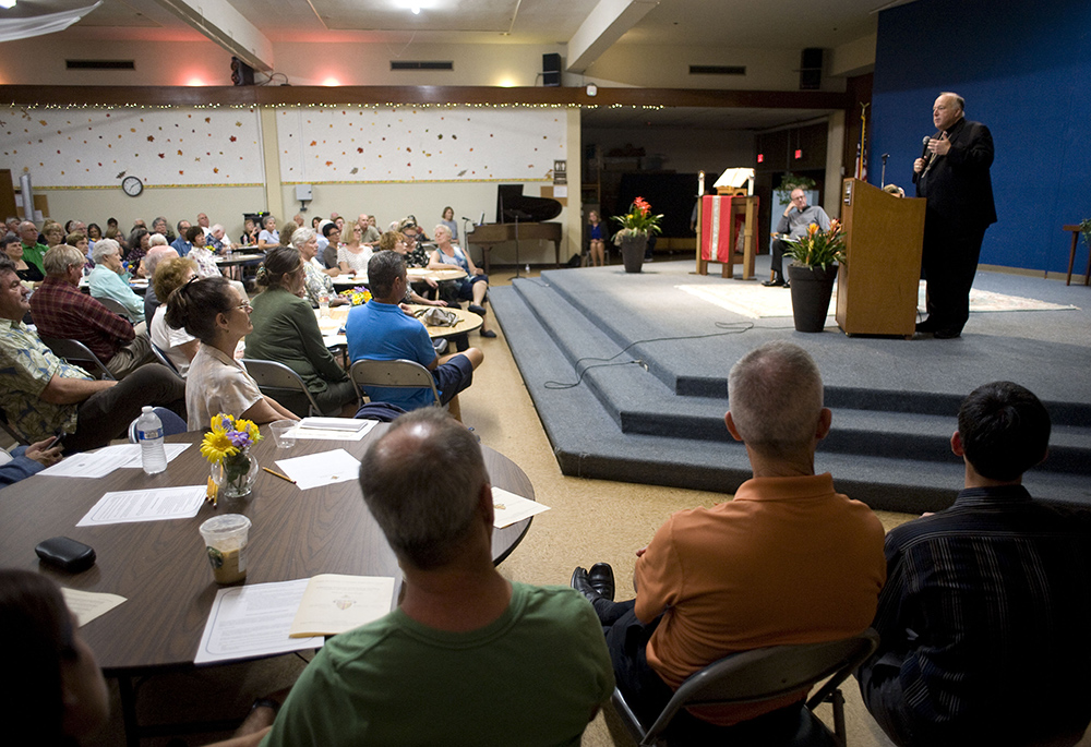 Then-San Diego Bishop Robert McElroy gives an opening address at a public gathering Oct. 1, 2018, at Our Mother of Confidence Parish Hall in San Diego. McElroy conducted the first of eight sessions throughout the diocese to listen to the public about the issue of clergy sexual abuse. More than 300 people participated in the session.(CNS/David Maung)