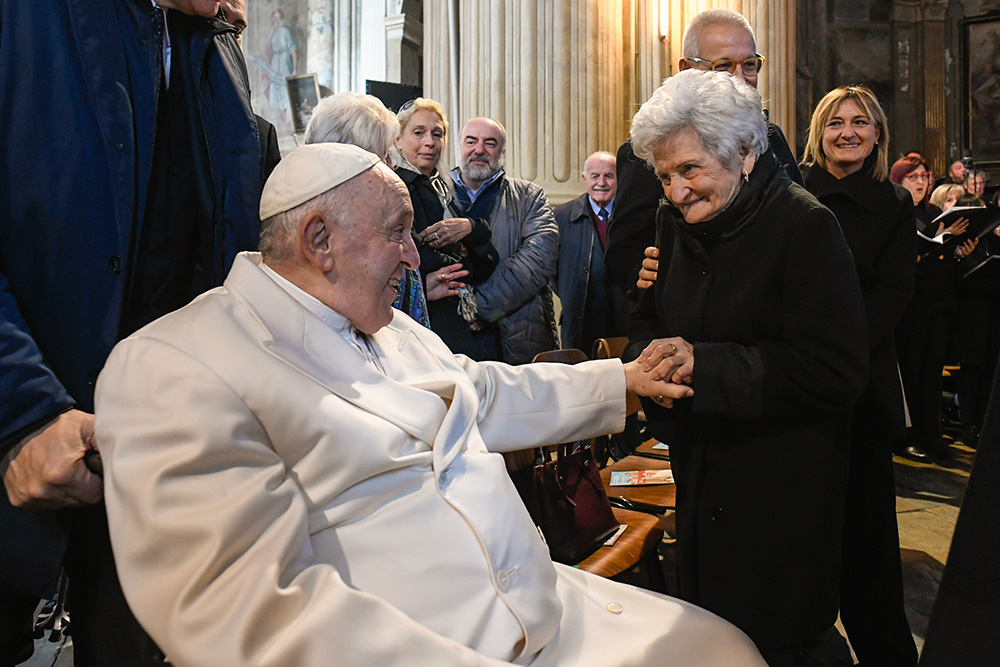 Pope Francis greets his cousin Carla Rabezzana before celebrating Mass Nov. 20, 2022, in the cathedral of Asti, Italy. (CNS/Vatican Media)