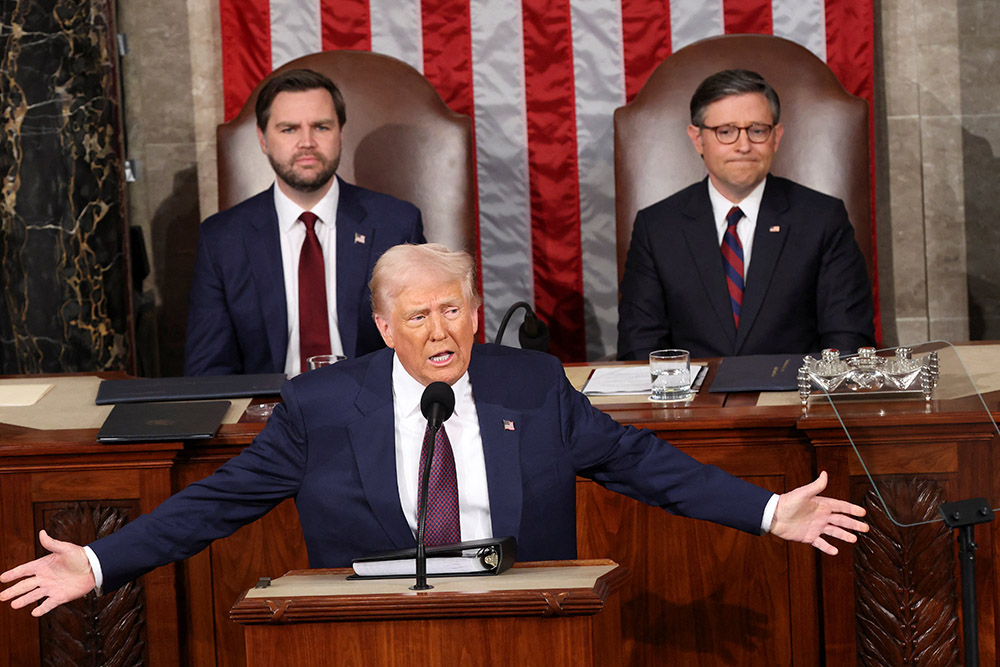 U.S. Vice President JD Vance and House Speaker Mike Johnson, R-La., look on as President Donald Trump addresses a joint session of Congress at the U.S. Capitol in Washington March 4, 2025. (OSV News/Reuters/Kevin Lamarque)