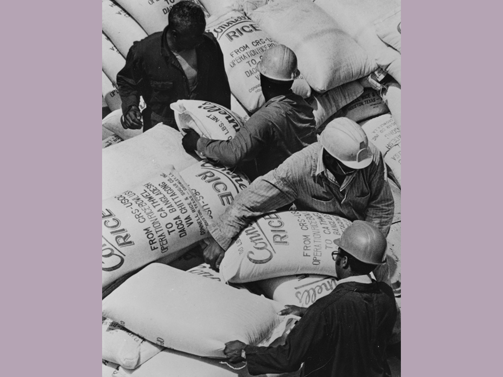 Workers in Philadelphia load a shipment of rice bound for Bangladesh in summer 1976, in a relief effort handled by Catholic Relief Services, using funds from the first national Operation Rice Bowl campaign. (CNS/Bob Strawn)