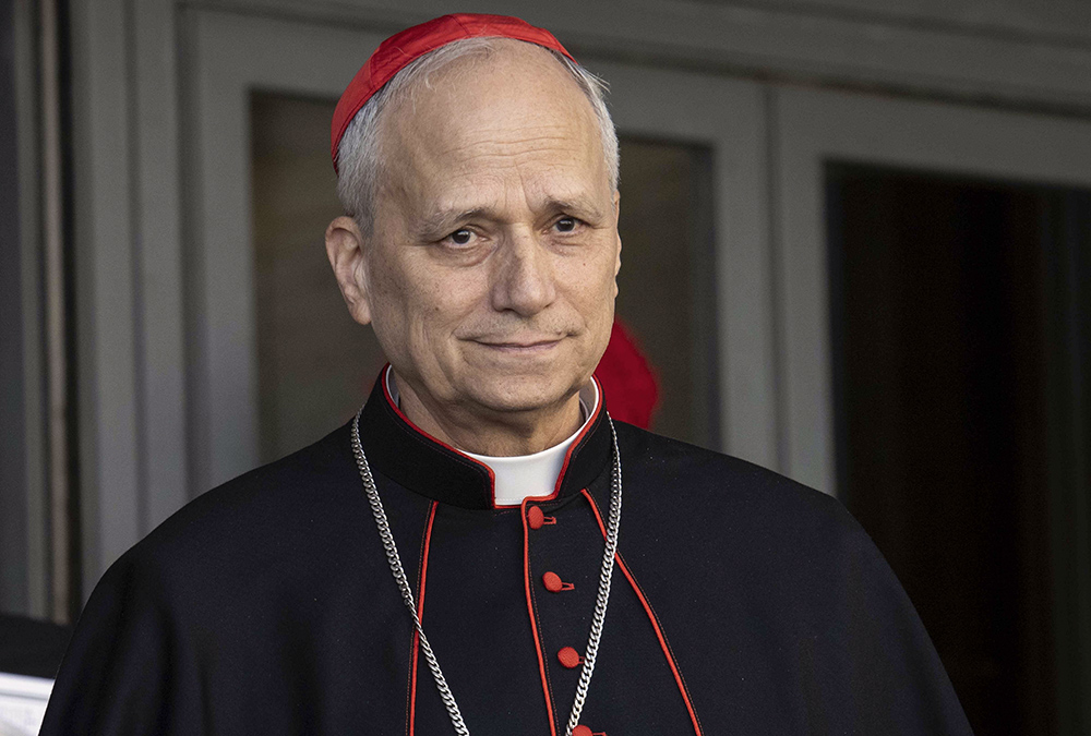 U.S.-born Cardinal Robert Prevost, prefect of the Dicastery for Bishops under Pope Francis, leaves the Vatican Synod Hall April 22, 2025, after the first general congregation of the College of Cardinals. (CNS/Vatican Media)