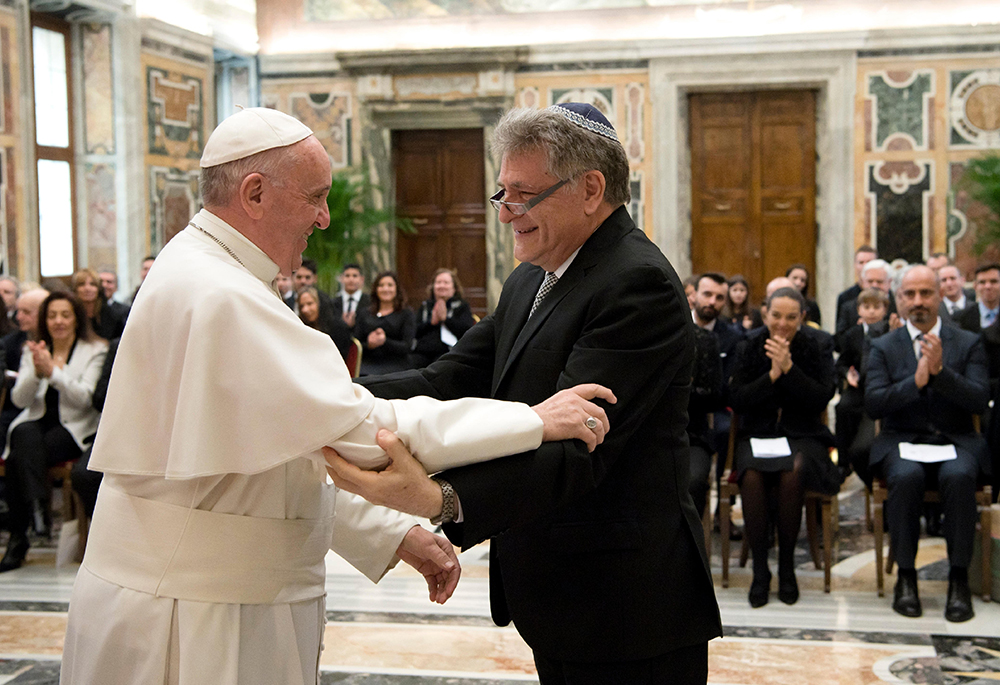 Pope Francis greets his longtime friend Rabbi Abraham Skorka during a meeting with an interreligious group of scholars at the Vatican Feb. 23. Pope Francis died April 21, 2025, at age 88. Rabbi Shmuly Tanklowitz writes that Francis "was the type of role model we want to see in the world." (CNS photo/L'Osservatore Romano)
