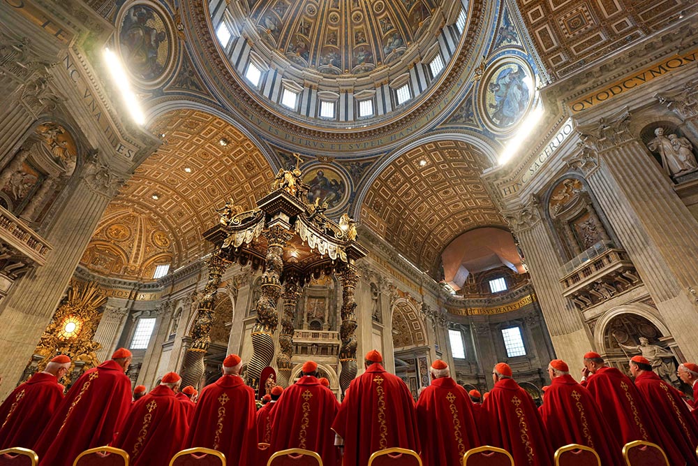 Cardinals gather to celebrate Mass with Argentine Cardinal Leonardo Sandri, subdean of the College of Cardinals, on the fifth day of the “novendiali,” nine days of mourning for Pope Francis, at the Altar of the Confession in St. Peter’s Basilica at the Vatican April 30, 2025. (CNS/Lola Gomez)