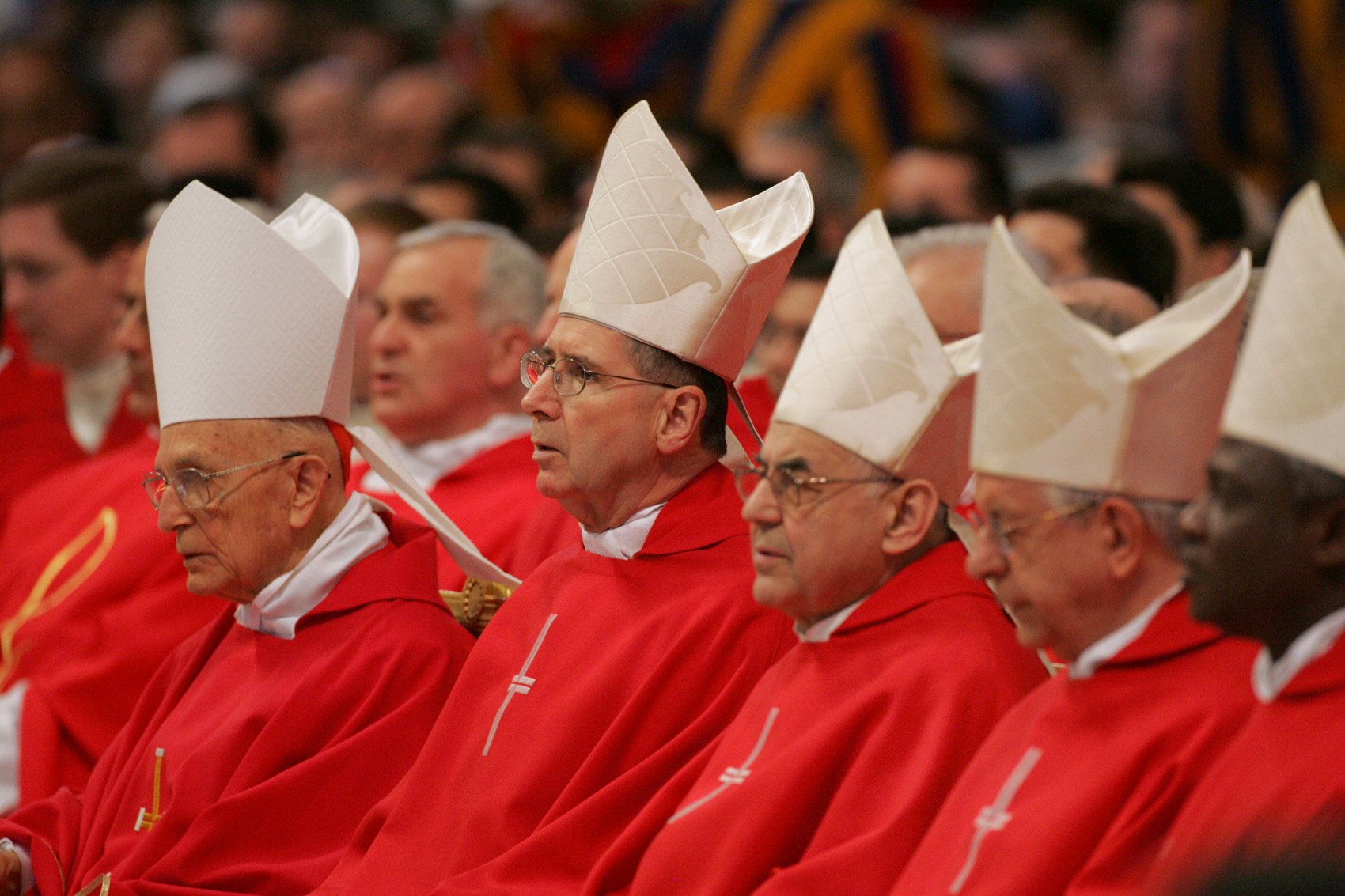 In this April 13, 2005, photo, five cardinals, including Los Angeles Cardinal Roger Mahony, second from left, attend a memorial Mass for Pope John Paul II at St. Peter's Basilica. (CNS/Nancy Wiechec)