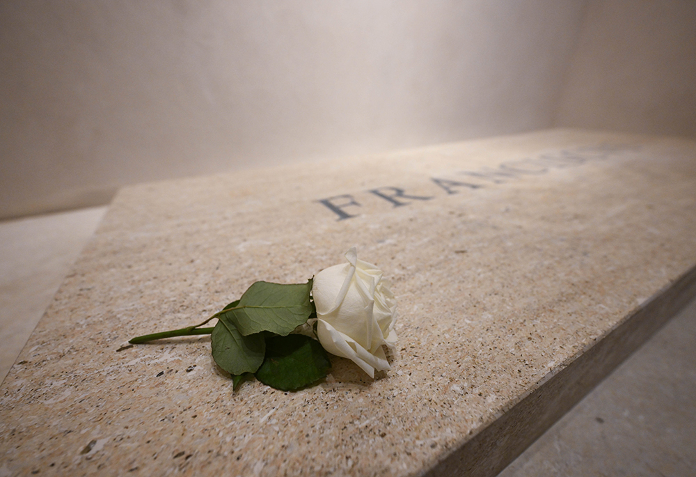 A single white rose sits on the tomb of Pope Francis in Rome's Basilica of St. Mary Major early on April 27, 2025. (CNS/Vatican Media)