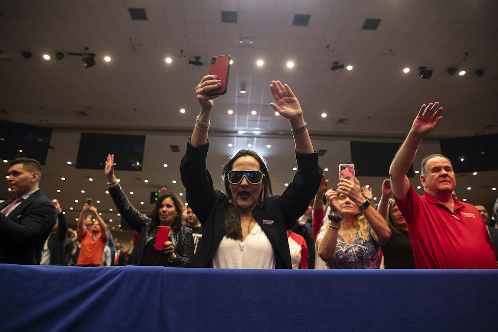 Supporters of President Donald Trump pray during an "Evangelicals for Trump Coalition Launch" at King Jesus International Ministry on Jan. 3 in Miami, Florida. (AP/ Evan Vucci)