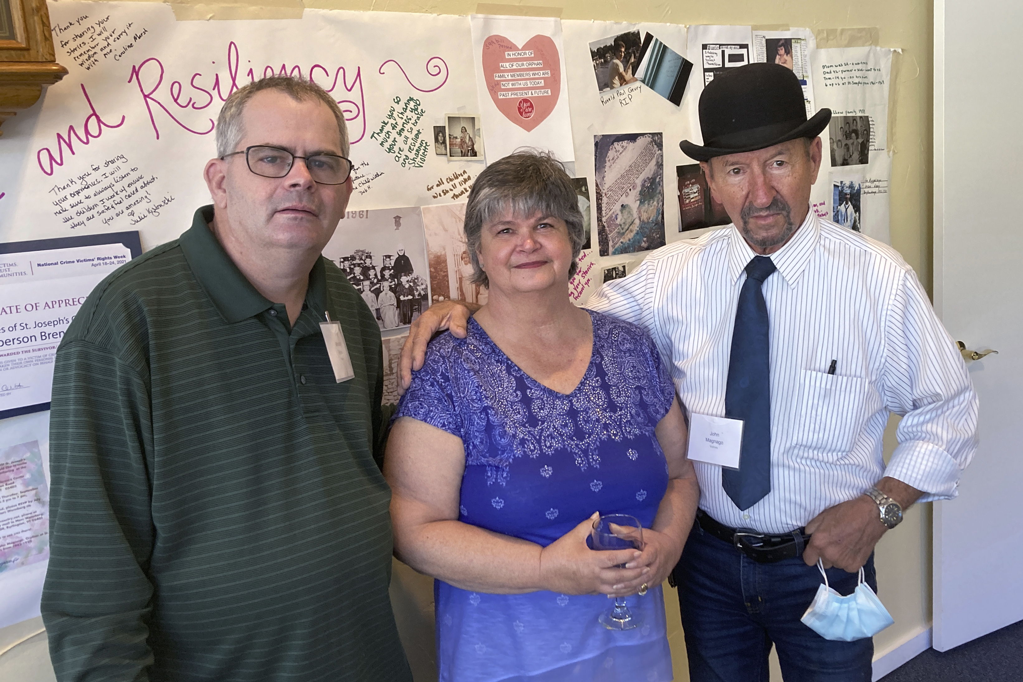 Michael Ryan, of Buckingham, Va., Brenda Hannon, of Williston, Vt. and John Magnago, of Miami, from left to right, pose in South Burlington, Vt., during a reunion of orphans from the St. Joseph's Orphanage in South Burlington, Vt., Thursday, Sept. 16, 202