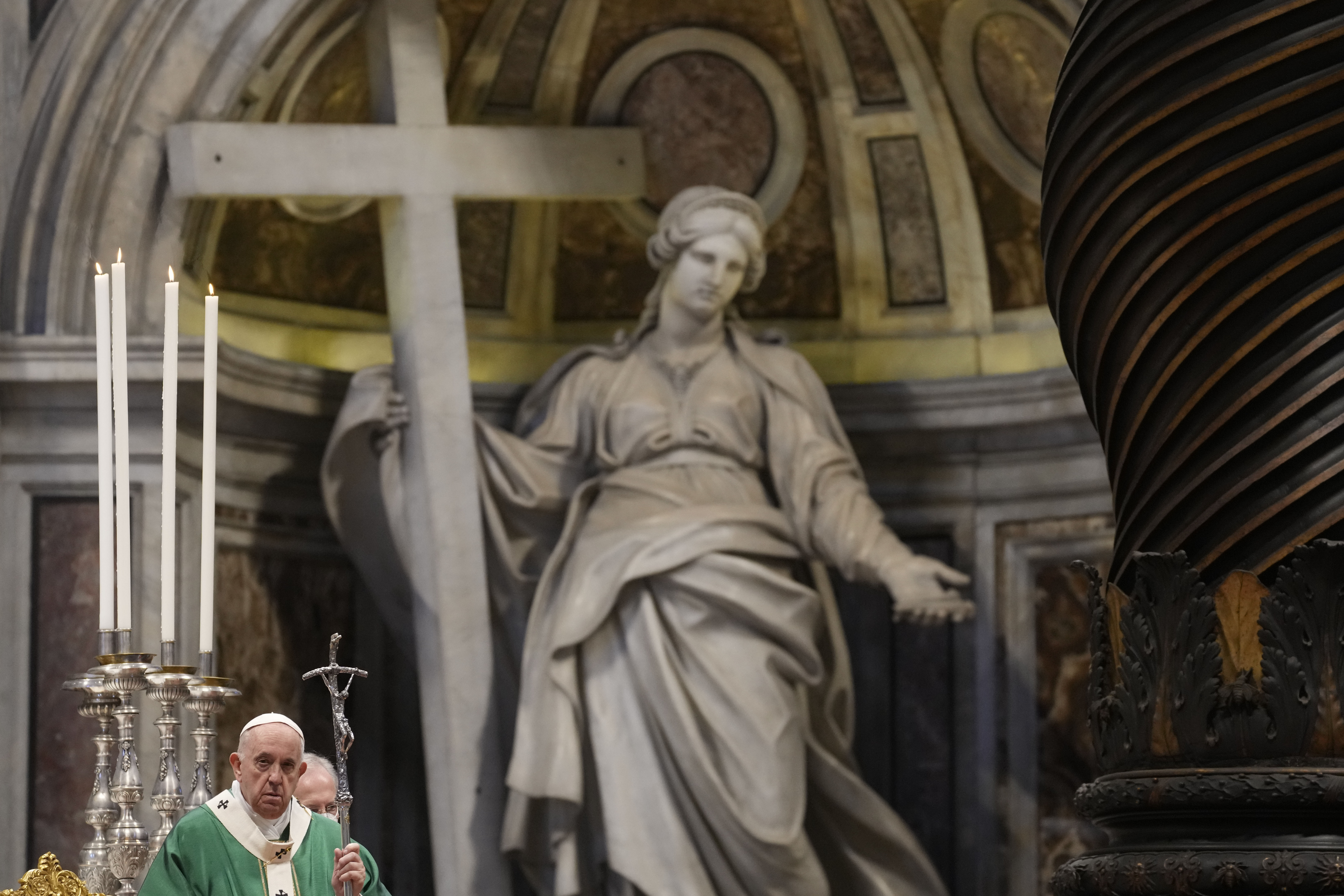 In this Oct. 10, 2021 file photo, Pope Francis holds the pastoral staff as he celebrates a mass in St. Peter's Basilica for the opening of the bishops' synod, at the Vatican. A European court ruled Tuesday, Oct. 12, 2021, that the Vatican couldn't be sued