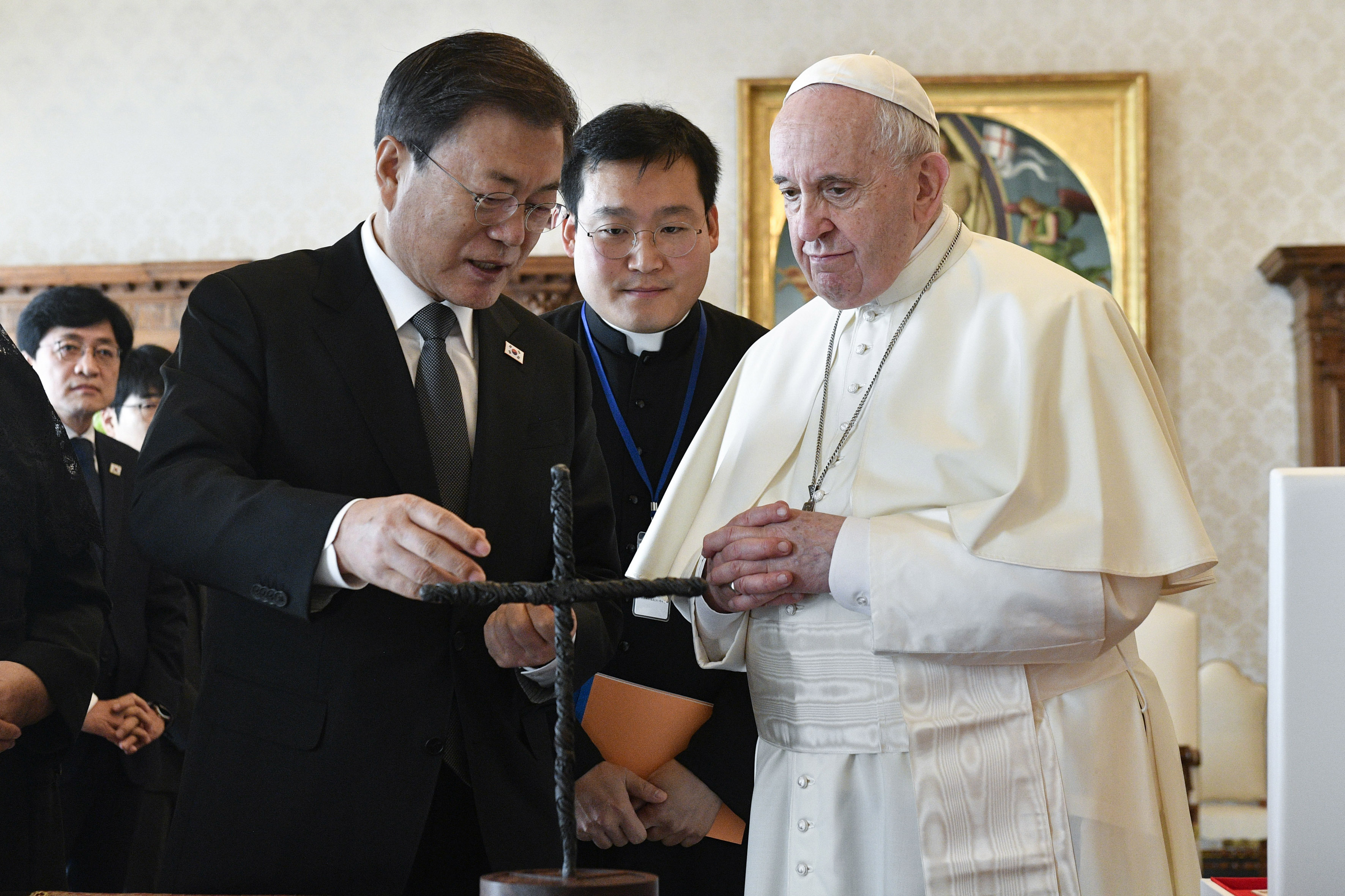 South Korea's President Moon Jae-in exchanges gifts with Pope Francis as they meet at the Vatican, Friday, Oct. 29, 2021. (Vatican Media via AP)