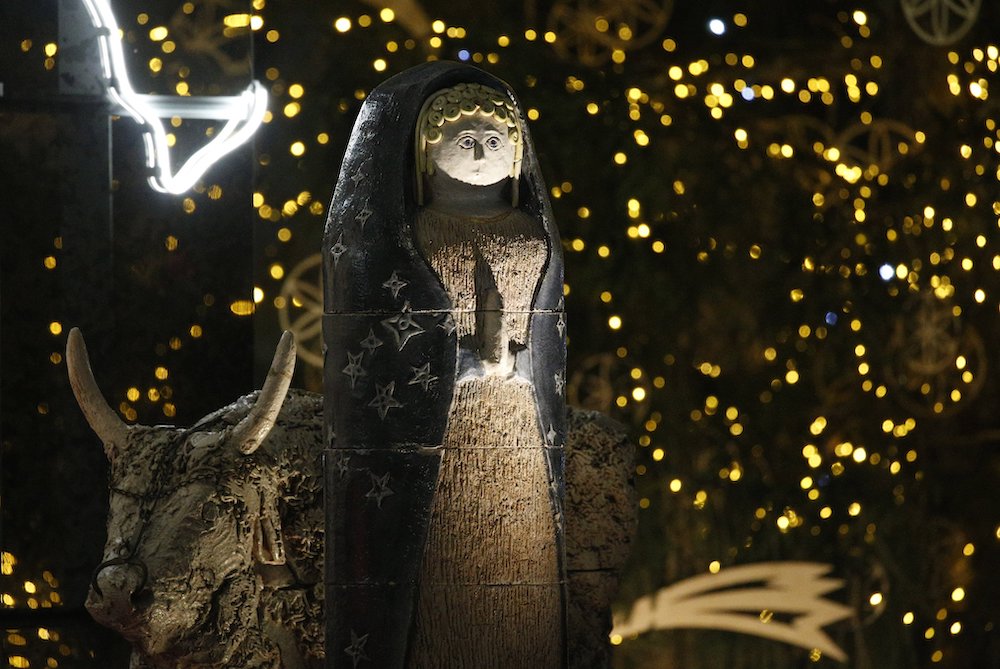 A figure of Mary is pictured in the Nativity scene in St. Peter's Square at the Vatican Dec. 14. The 52 ceramic statues were created by an arts high school in Castelli, Italy, between 1965 and 1975. (CNS/Paul Haring)