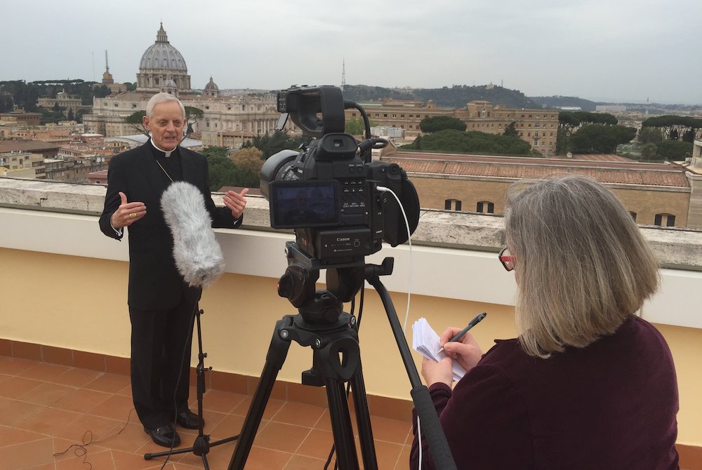 CNS Rome bureau chief Cindy Wooden interviews Cardinal Donald Wuerl of Washington, D.C., in Rome April 8, 2016. (CNS/Robert Duncan)