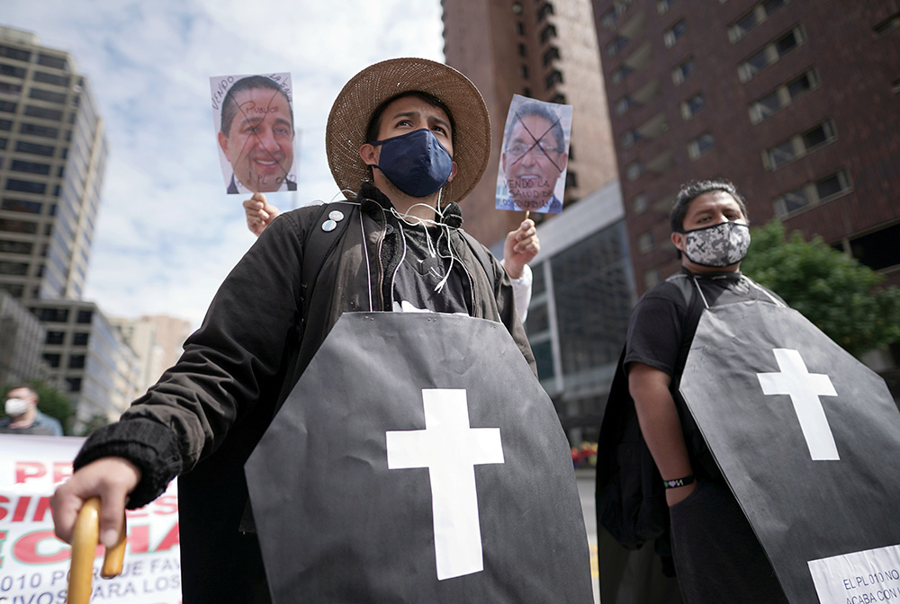 Workers and students participate in a protest against the economic policies of Colombian President Ivan Duque in Bogotá, Colombia, Nov. 19. (CNS/Reuters/Nathalia Angarita)