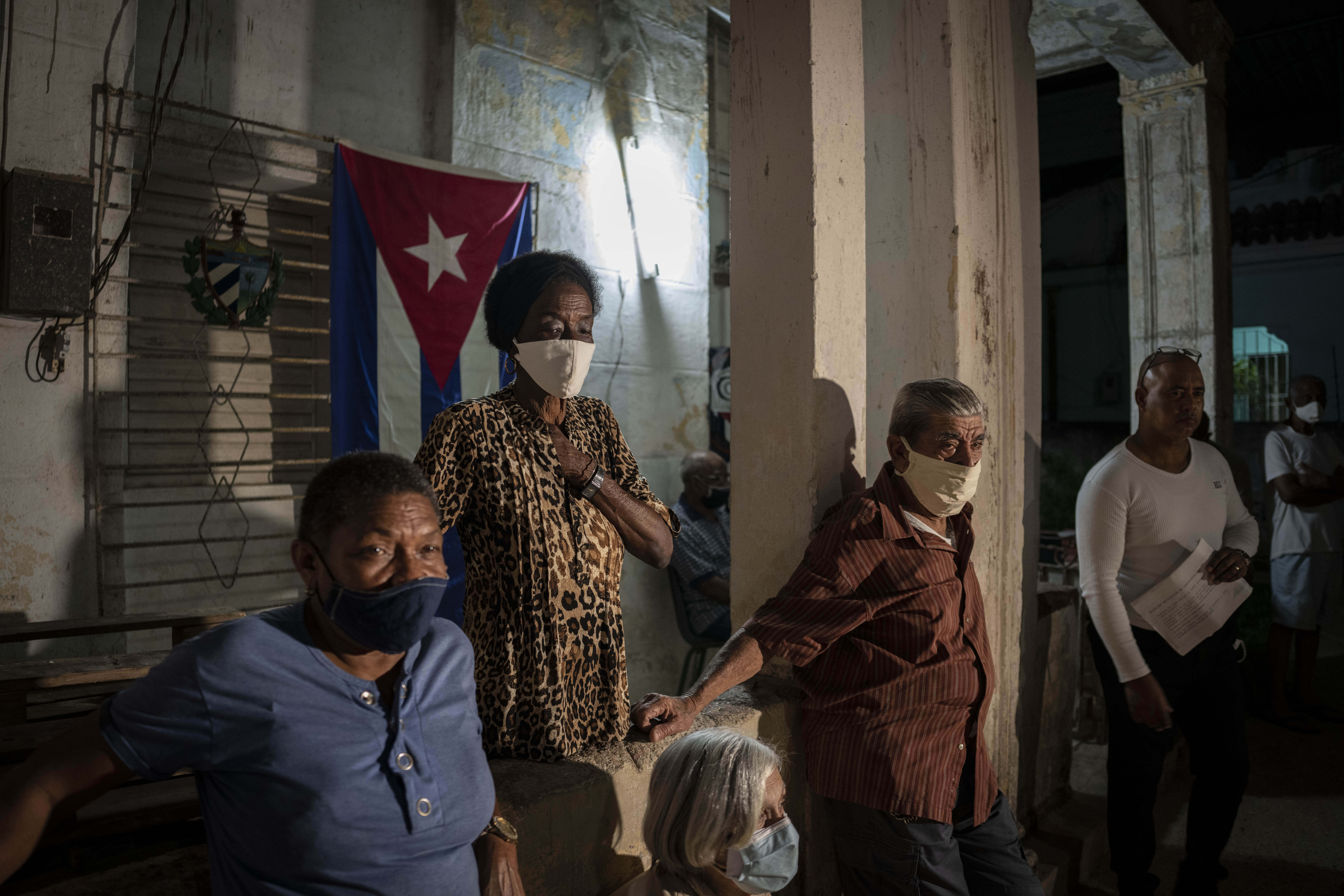 Residents attend a popular consultation to discuss the draft of a new family code, in Havana, Cuba, Friday, Feb. 11, 2022. (AP Photo/Ramon Espinosa)